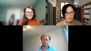 video still of webinar with three people on screen