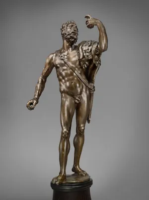 Bronze statue of nude standing man.